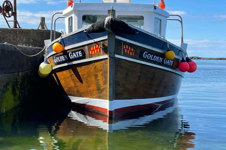 a small boat in a body of water